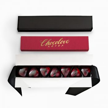 Heart Shaped Cherry Cordials Unwrapped in Valentine's Day Gift Box with Opened Lid and Red Sleeve - Chocolove's Cherry Cordials Gift Box